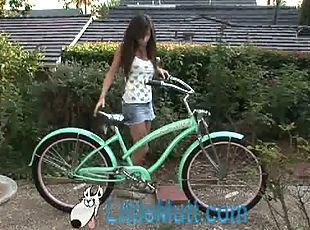 April Oneil rides a bike and masturbates in a park